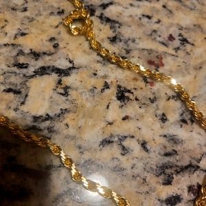 14 karat yello gold diamond rope chain